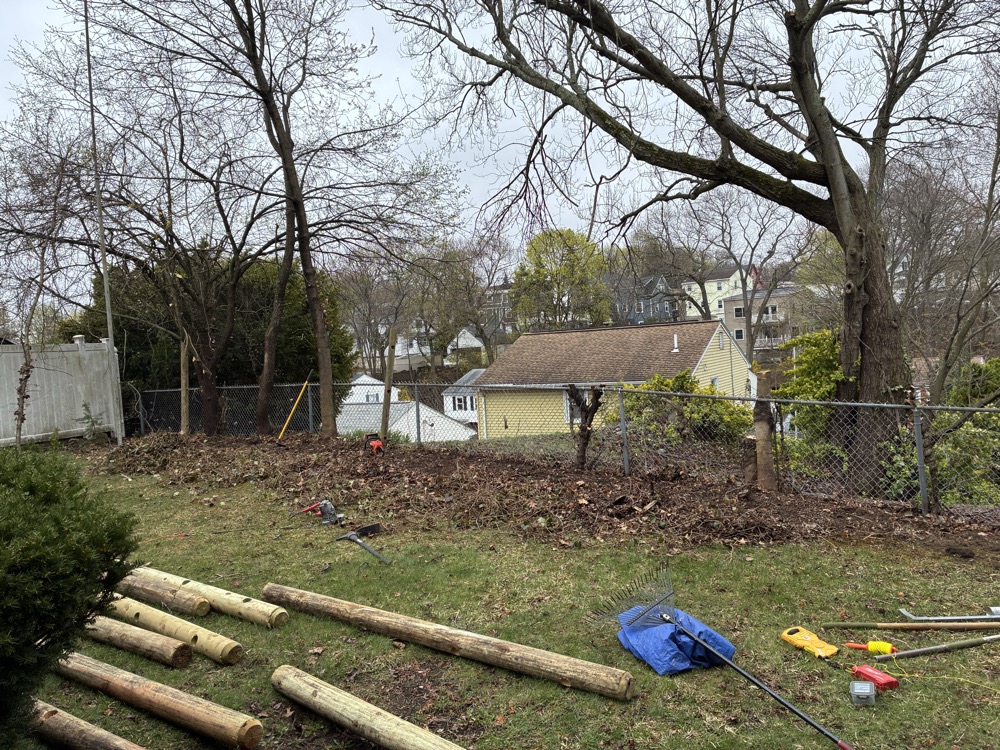 New cedar picket fence installation